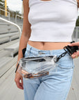 Person wearing the clear orlando stadium belt bag around their waist.