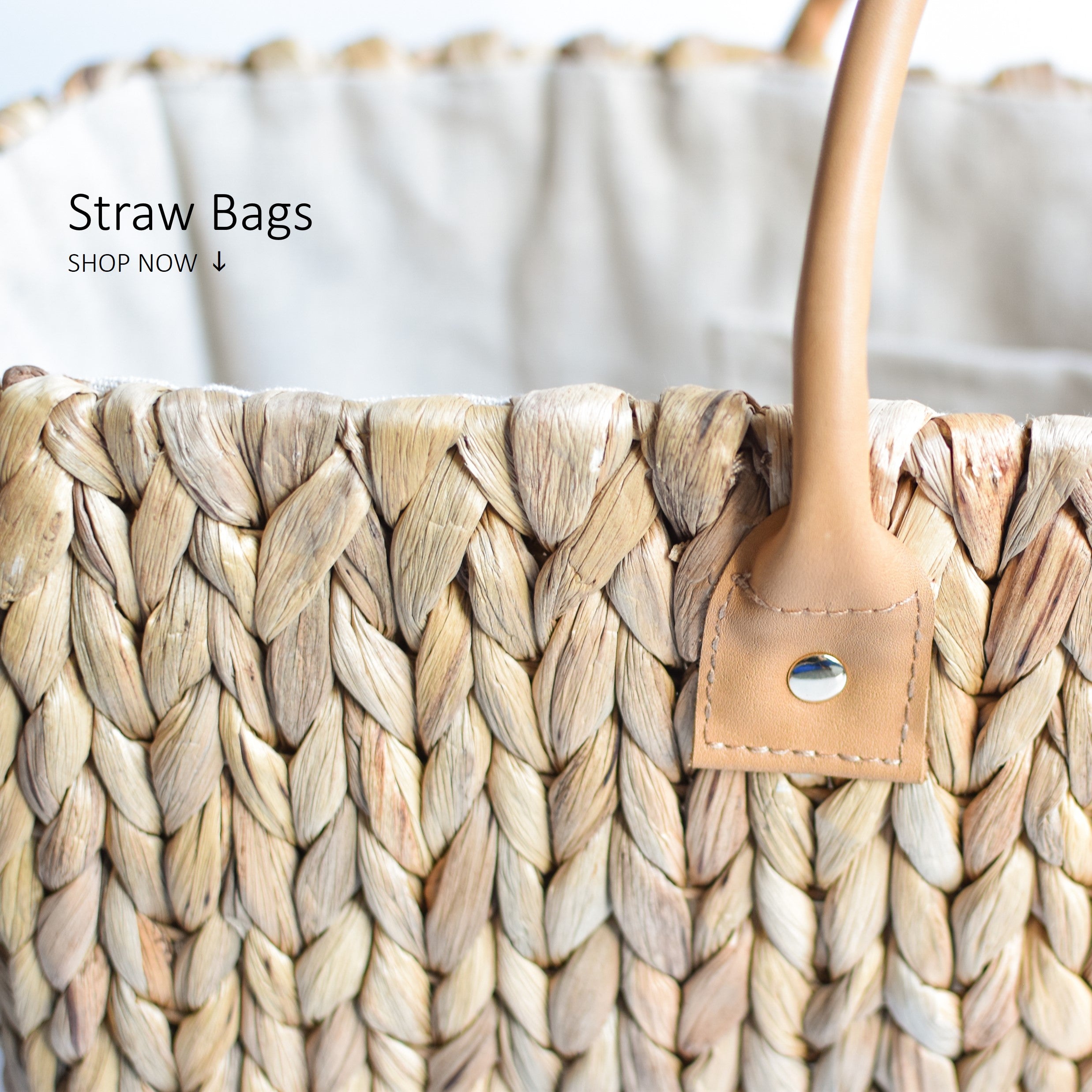 Close-up image of the XL Fullerton Straw Bag with Leather Handles