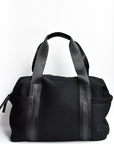 Black mesh duffel bag with leather trim details and black glossy liner.