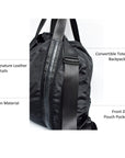 Black nylon convertible backpack tote with leather details.