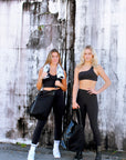 two people holding Anya & Niki Vero Bags