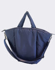 large puffy navy nylon tote bag with crossbody strap
