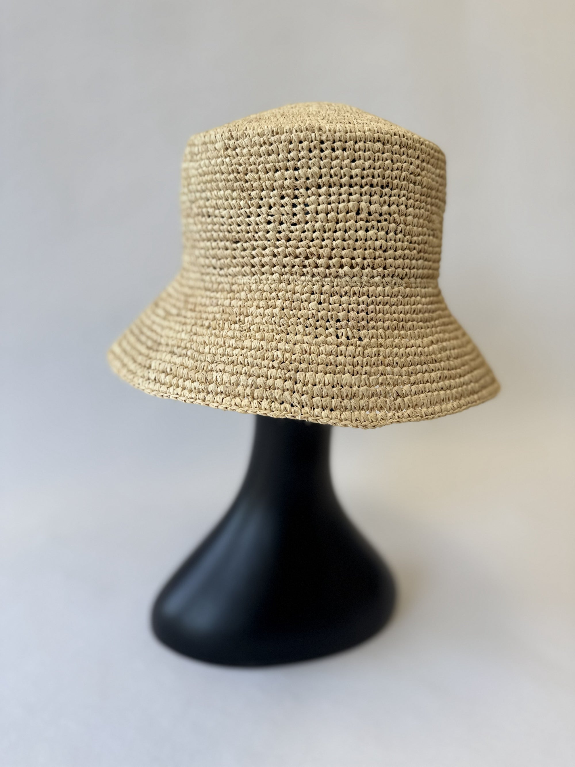 Straw bucket hat on a mannequin 