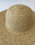 close up of beige straw hat