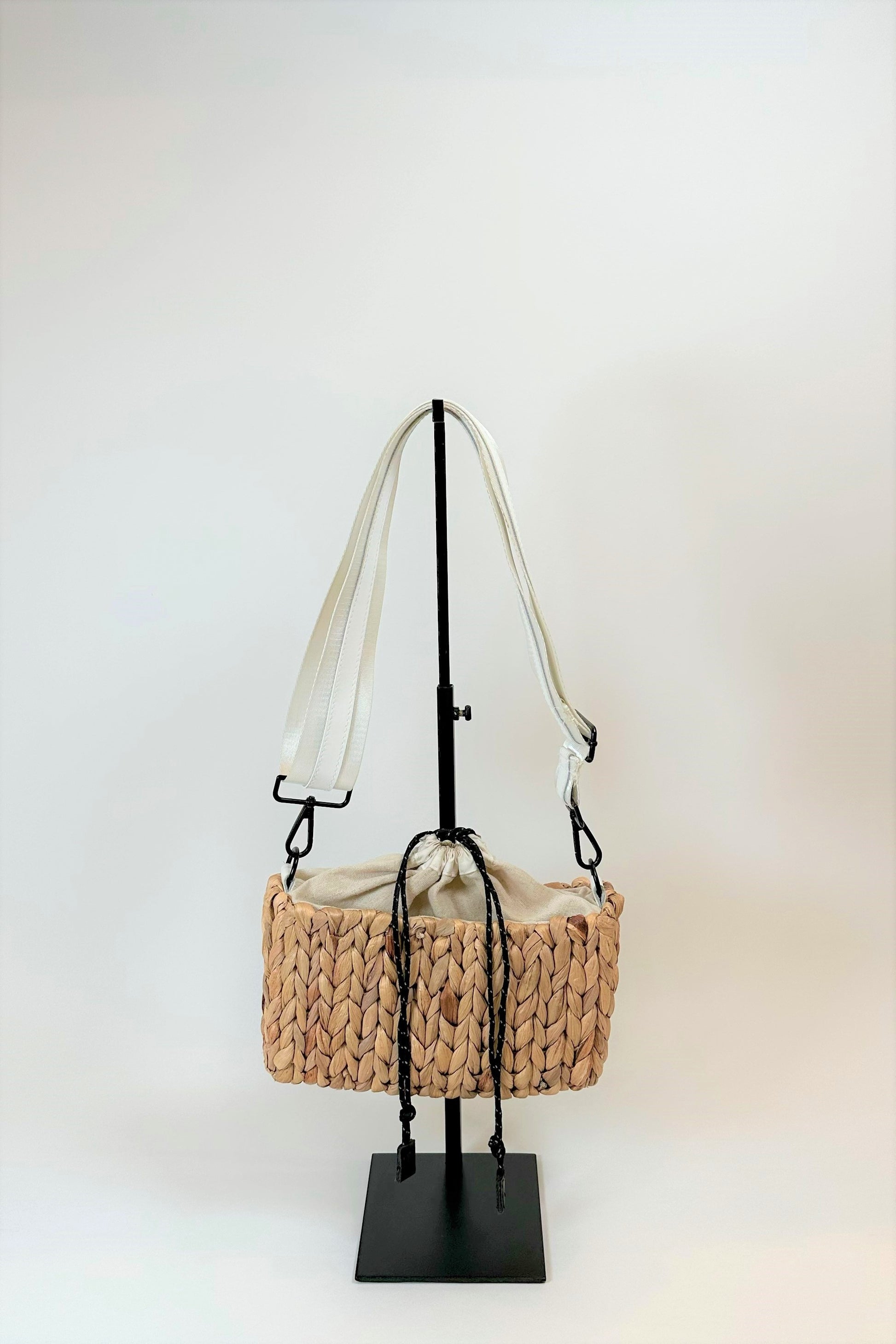 Mini straw bag with white crossobdy strap with leather details