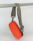 Orange nylon belt bag with grey crossbody strap and grey leather detail