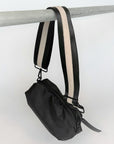 black nylon belt bag with black crossbody strap with cream leather detail