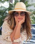 person wearing The Favorite Straw Panama Hat with tan leather band