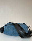 Denim belt bag with black crossbody/belt bag strap with black leather detail