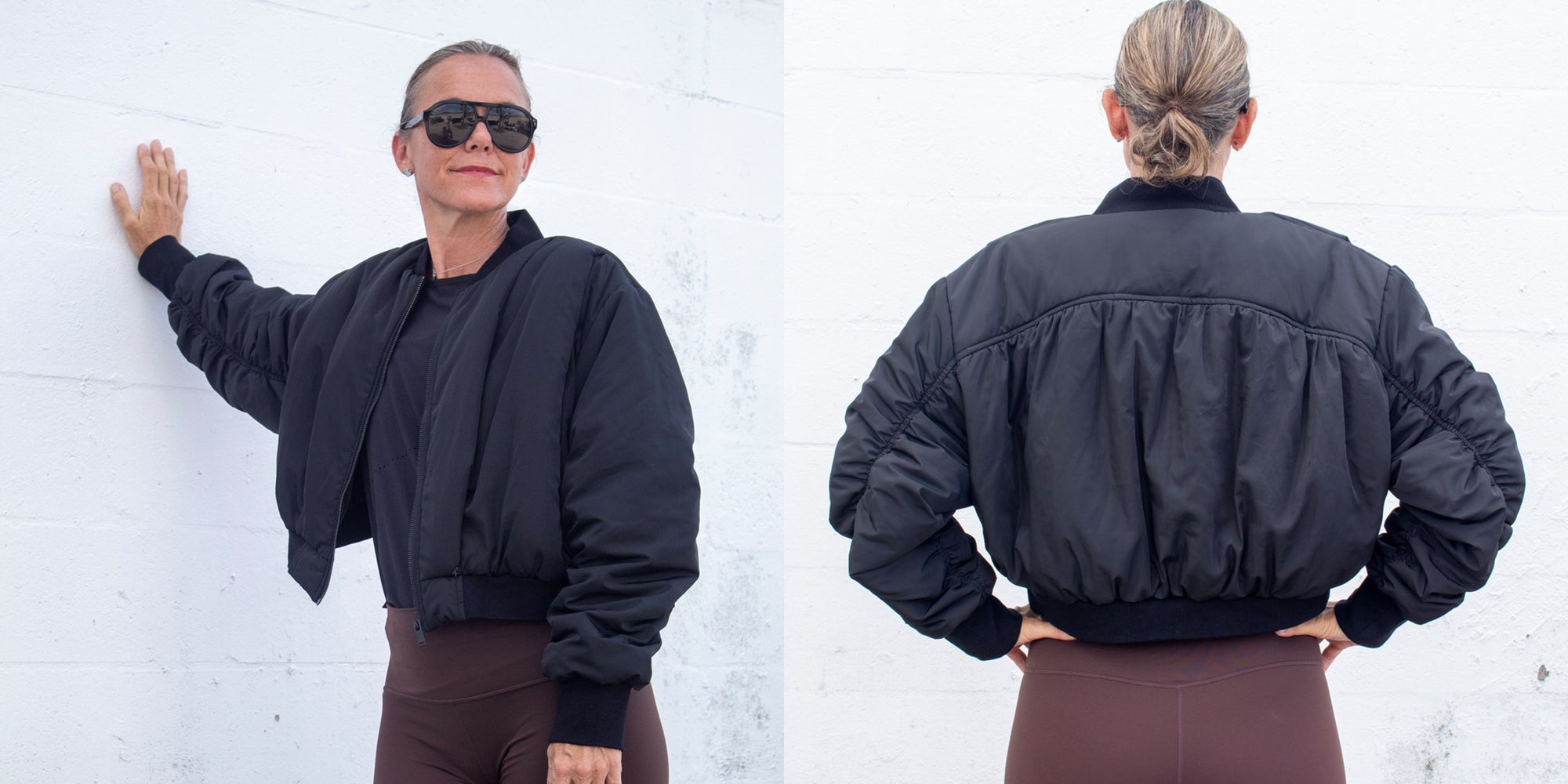 Person wearing a black bomber jacket, shown from front and back, against a white wall.