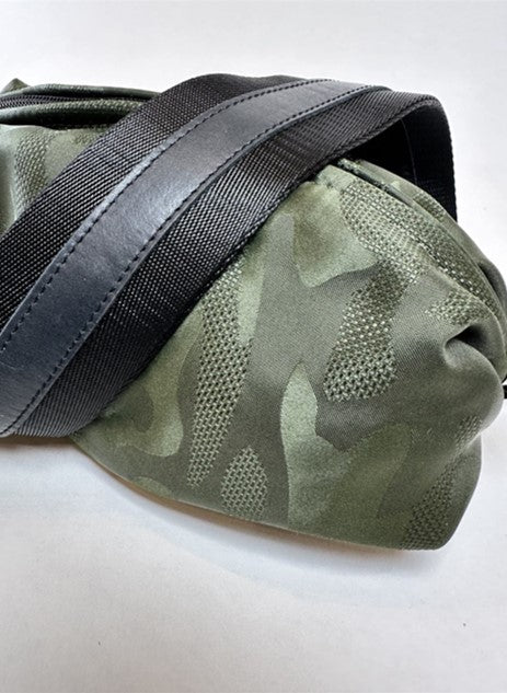 olive camo crossbody belt bag with black nylon strap with black leather details