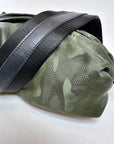 olive camo crossbody belt bag with black nylon strap with black leather details