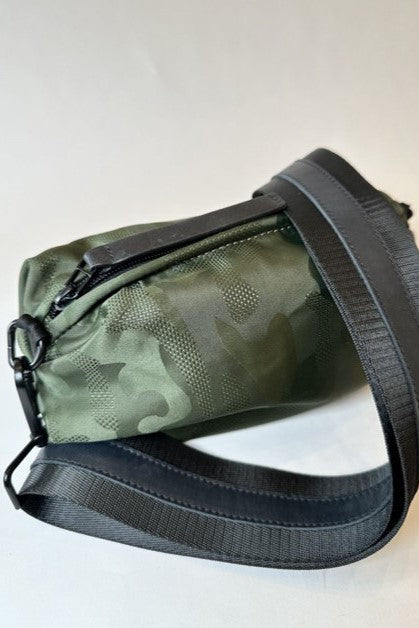 olive camo crossbody belt bag with black nylon strap with black leather details