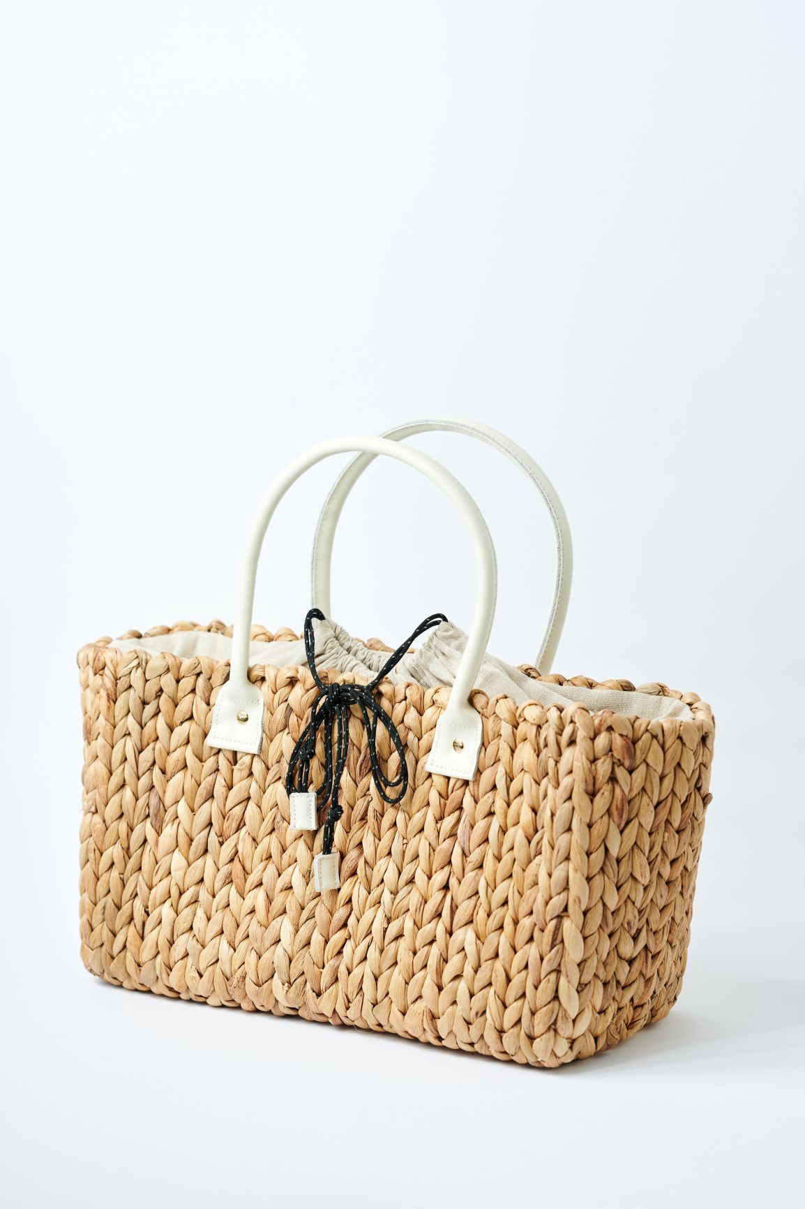 medium natural hyacinth straw tote with linen cinch top