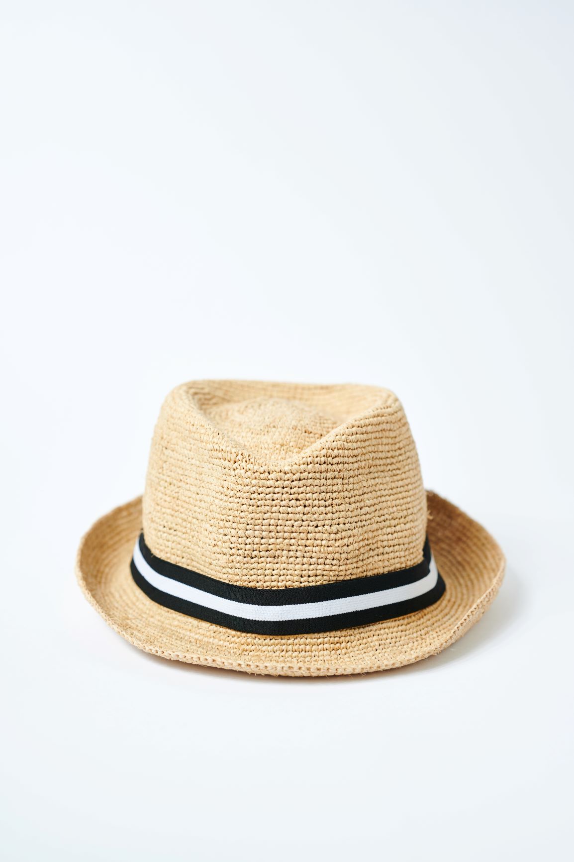 Natural colored crochet straw fedora hat with black &amp; white stripe band.