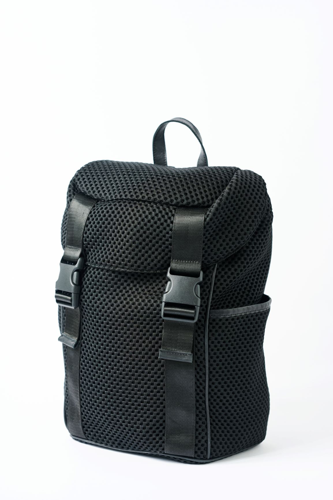 Black mesh backpack with leather details and shiny silver drawstring top.