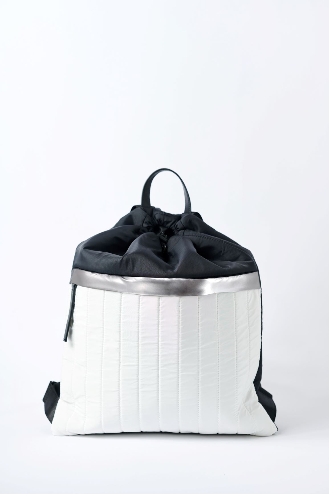 Black & white nylon cinch top backpack with signature leather and shiny silver details.