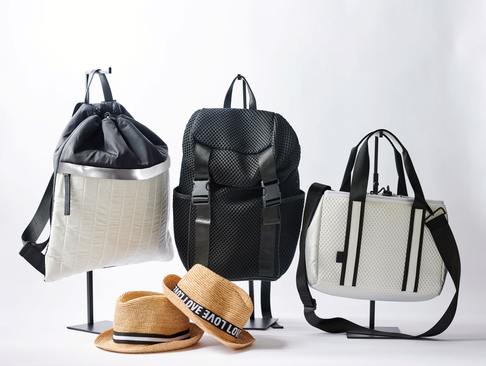 Collection of Anya &amp; Niki active nylon and mesh bags and straw hats. 