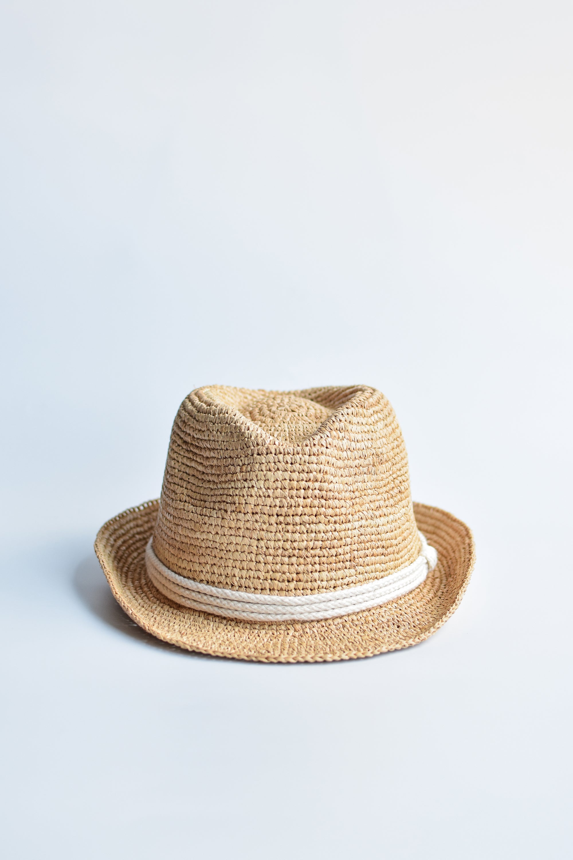 Natural colored crochet straw fedora hat with ivory rope band.