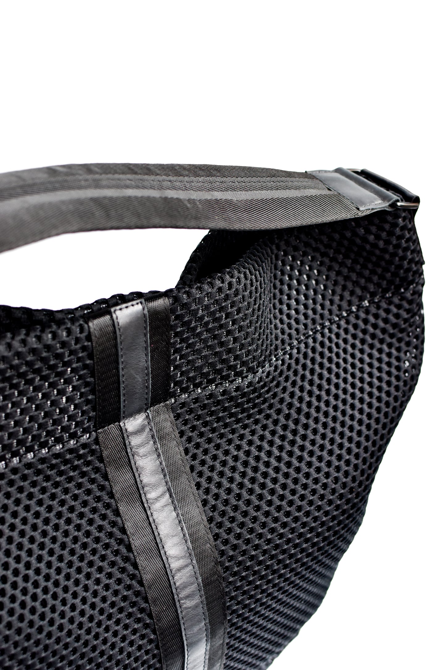 Black sporty mesh tote bag with black leather and webbing details.