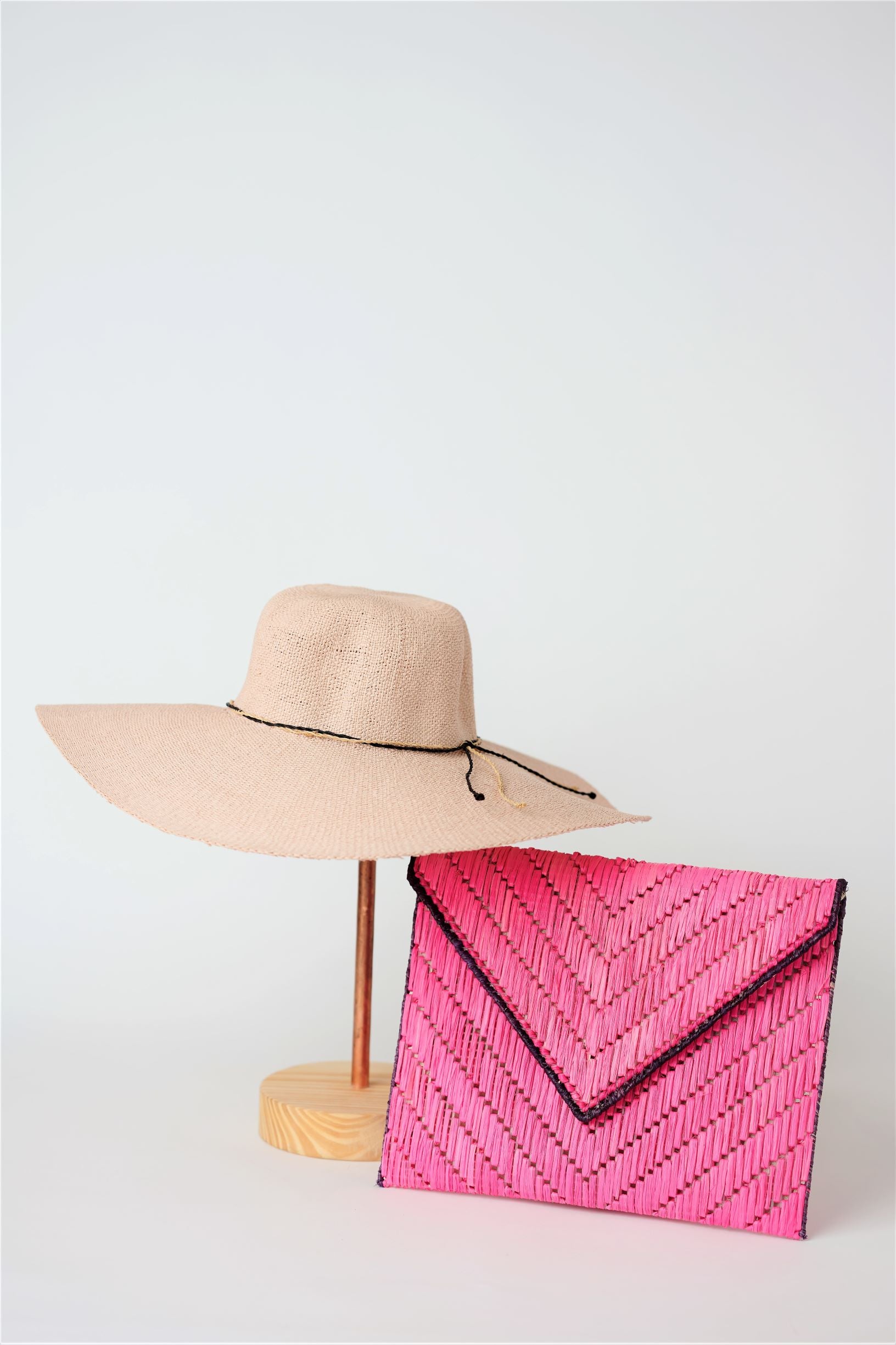 Collection of pink straw from Anya & Niki - the Big Hat and the Pixley Clutch