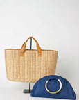 Collection of Anya & Niki Westmont straw bag with leather handles and Posey navy straw half moon clutch.