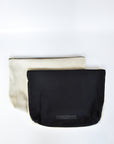 Black cotton canvas and off-white suede large pouch with brass zipper and leather logo label.