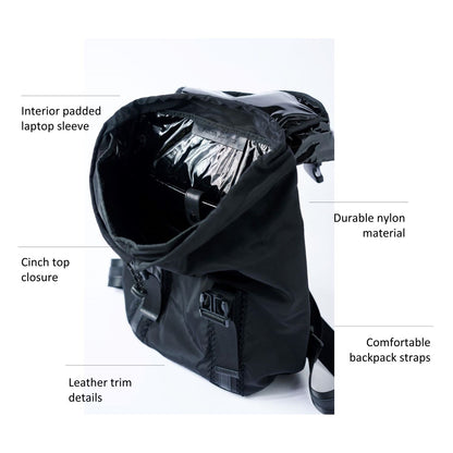 Black nylon flap top backpack with mesh and leather trim details and glossy black lining.