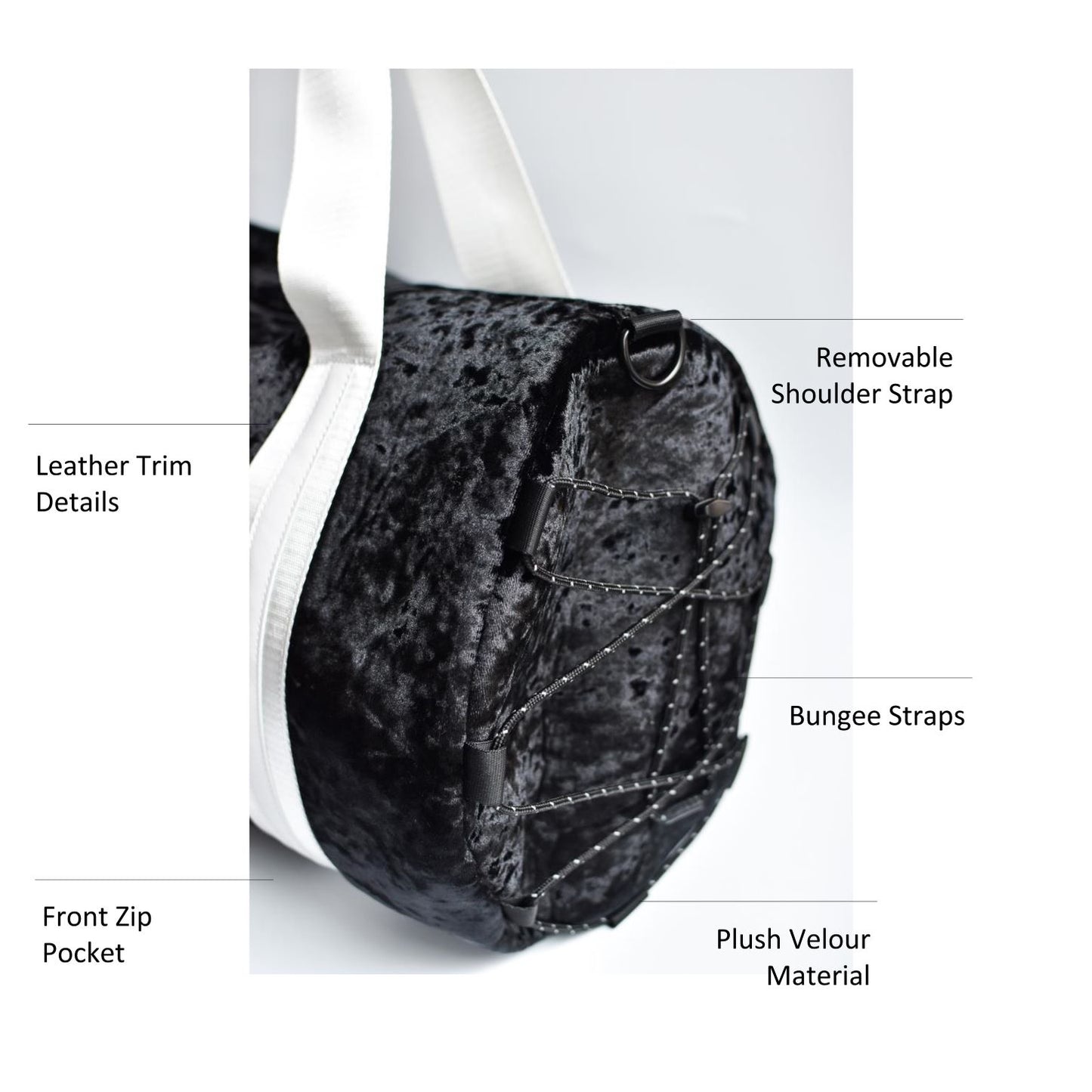 Black velour duffel bag with white straps and leather details.