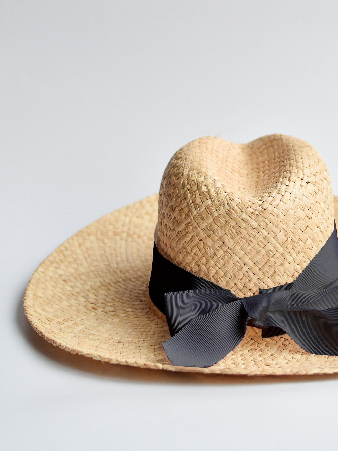 raffia straw panama hat with black grosgrain tie